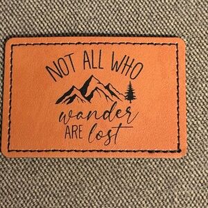 Leather Patch "Not All Who Wander Are Lost" - Tan iron on